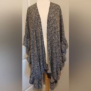 Boutique H Y F V E Cardigan Sz Large. Black with small print flowers.